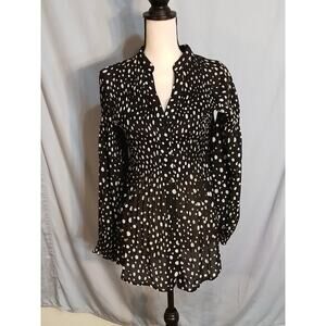 Hayley Matthews accordion  style black blouse with white dots